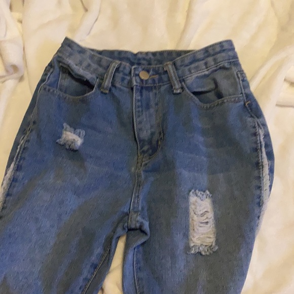 Blue jeans with rips down the side - Picture 2 of 4